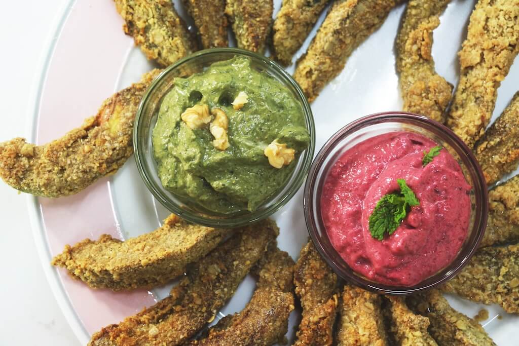 Avocado fries with green and red dips. What can you cook in an air fryer? Light, crispy avocado fries.