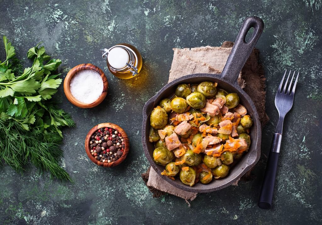 Roasted Brussels sprouts with meat. What can you cook in an air fryer? Crispy Brussels sprouts.